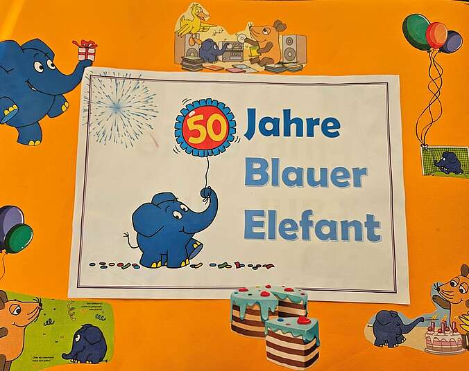 Plakat mit blauem Elefanten